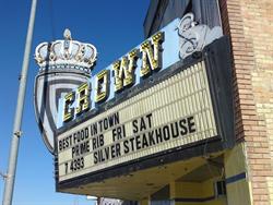 Advertising for the Silver Dollar Steakhouse on the Crown Theatre marquee. - , Utah
